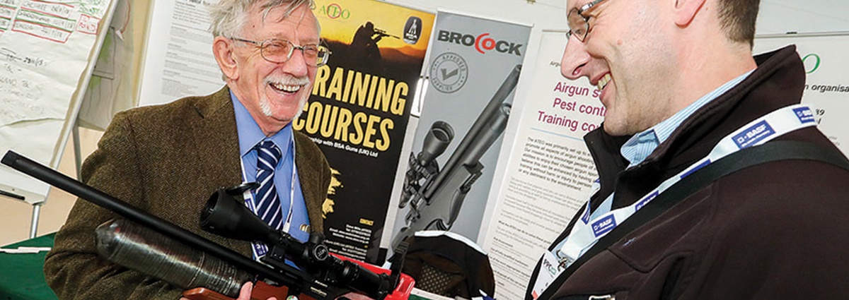 man showing gun man showing gun